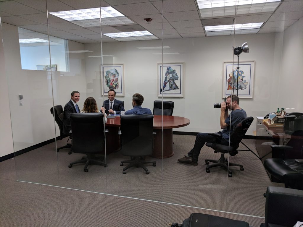 Connect with Clients Through Powerful Pictures and Taglines 7 photoshoot with law firm in conference room