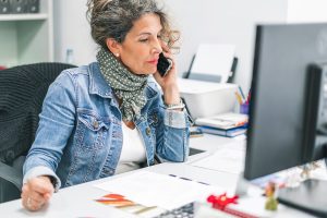 Woman working a desk in office