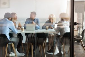 Team members meeting in conference room