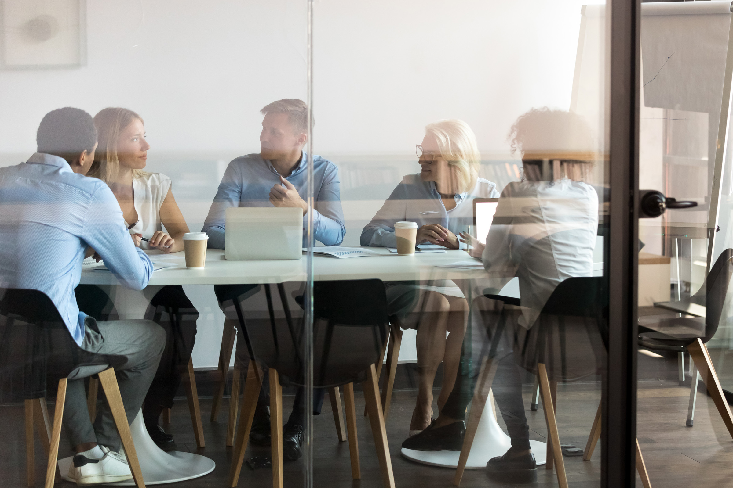 Team members meeting in conference room