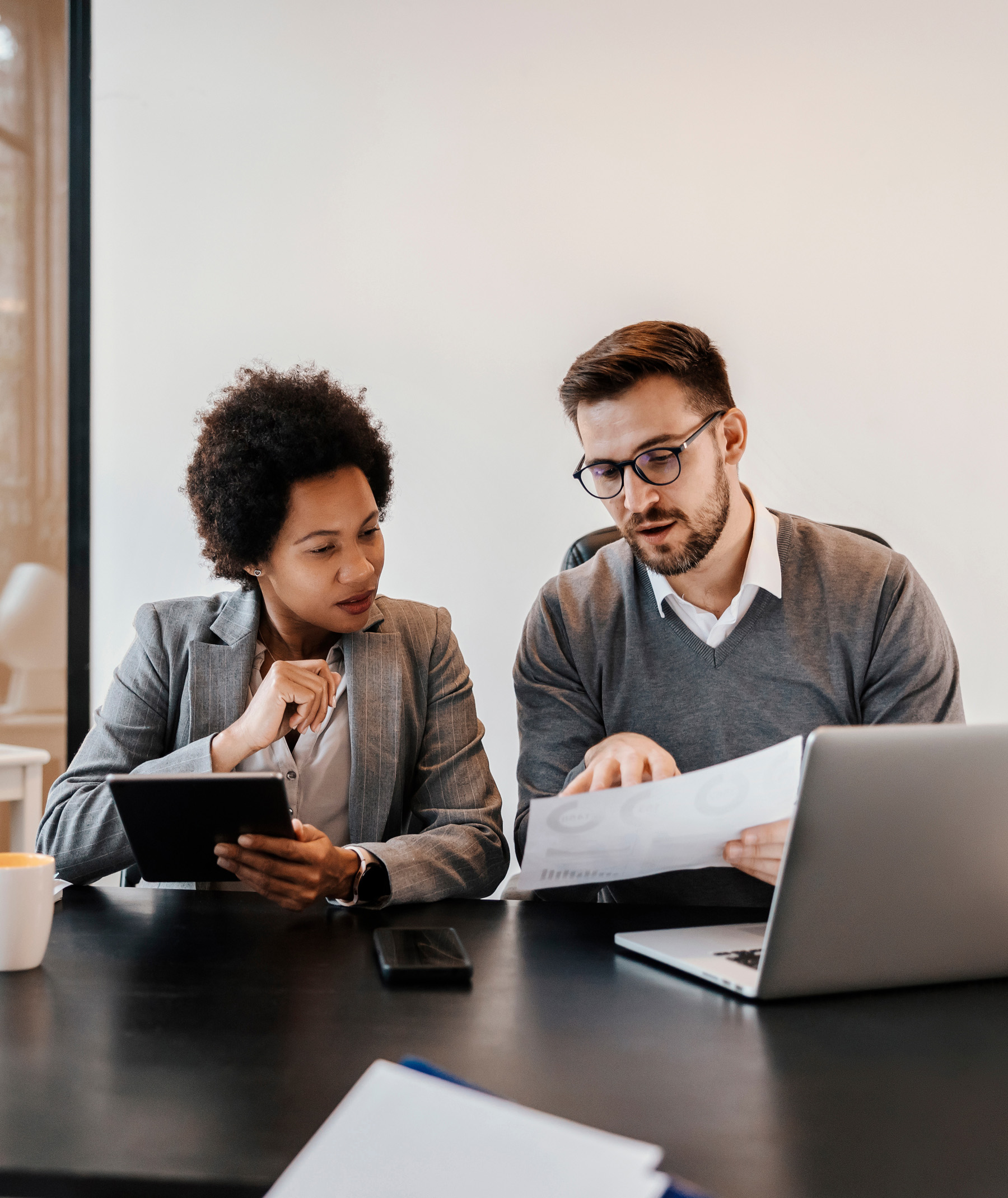 Attorneys in conversation at meeting
