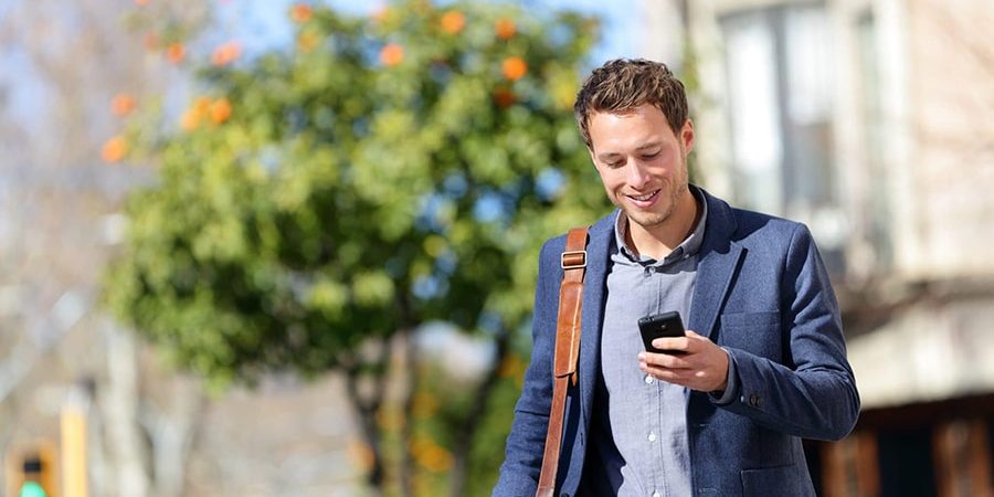 Man searches for a lawyer on his cell phone