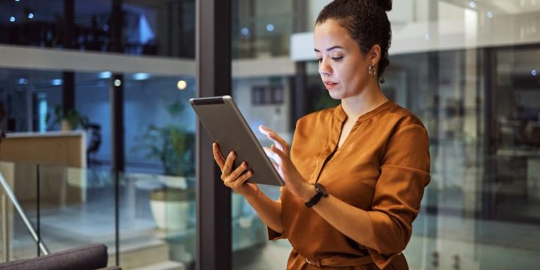 Woman reading law firm press release